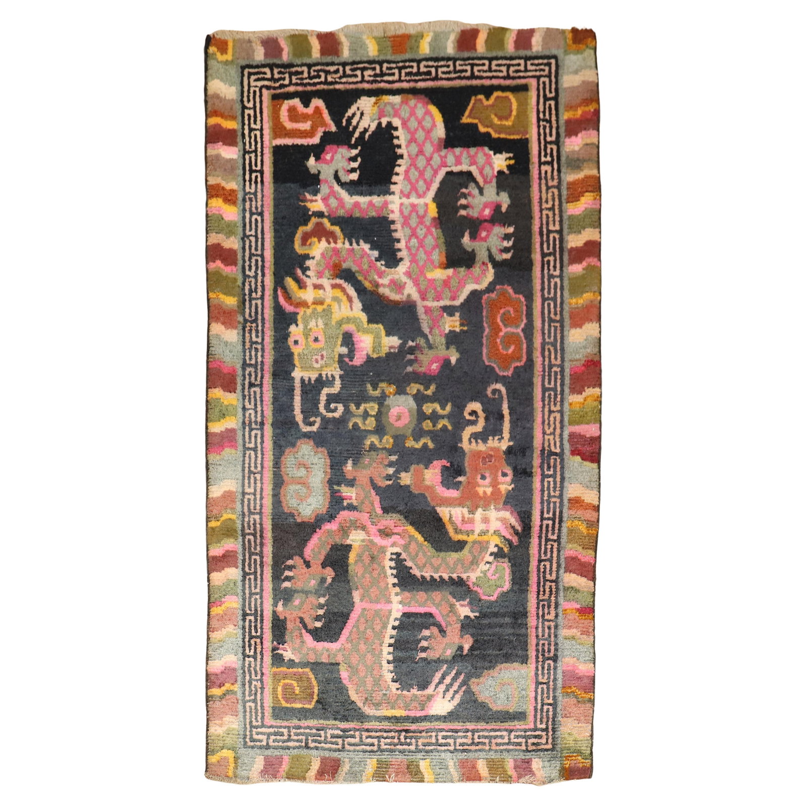 Vibrant Dragon Motif Early 20th Century Tibetan Hand-Woven Rug: Vibrant Dragon Motif Early 20th Century Tibetan Hand-Woven Rug This vibrant Tibetan rug from the early 20th century features a striking large-scale dragon motif, reflecting a traditional archaistic st
