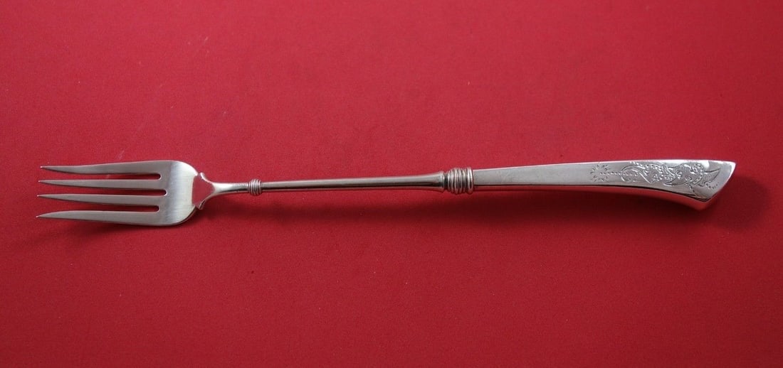 Gorham Angelo Sterling Silver Hollow Handle Serving Fork 10 1/4": Gorham Angelo Sterling Silver Hollow Handle Serving Fork 10 1/4" This exquisite serving fork from the Angelo pattern by Gorham is crafted from all sterling silver, showcasing the timeless elegance of 
