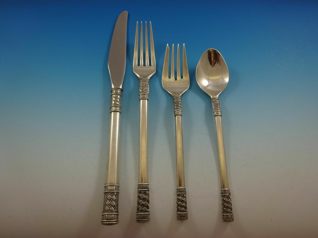 Wallace Aegean Weave Plain Sterling Silver 4-Piece Place Setting: Wallace Aegean Weave Plain Sterling Silver 4-Piece Place Setting Experience elegance with this Aegean Weave Plain 4-piece place setting by Wallace, crafted from high-quality sterling silver. This beau