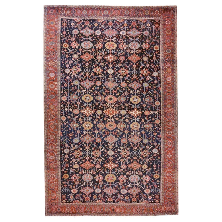 Rare 19th Century Persian Serapi Oversized Navy Wool Carpet 12'7 x 19'9: Rare 19th Century Persian Serapi Oversized Navy Wool Carpet 12'7 x 19'9 Discover the exquisite beauty of this antique Persian Serapi carpet, a stunning piece from the late 19th century. It features a 