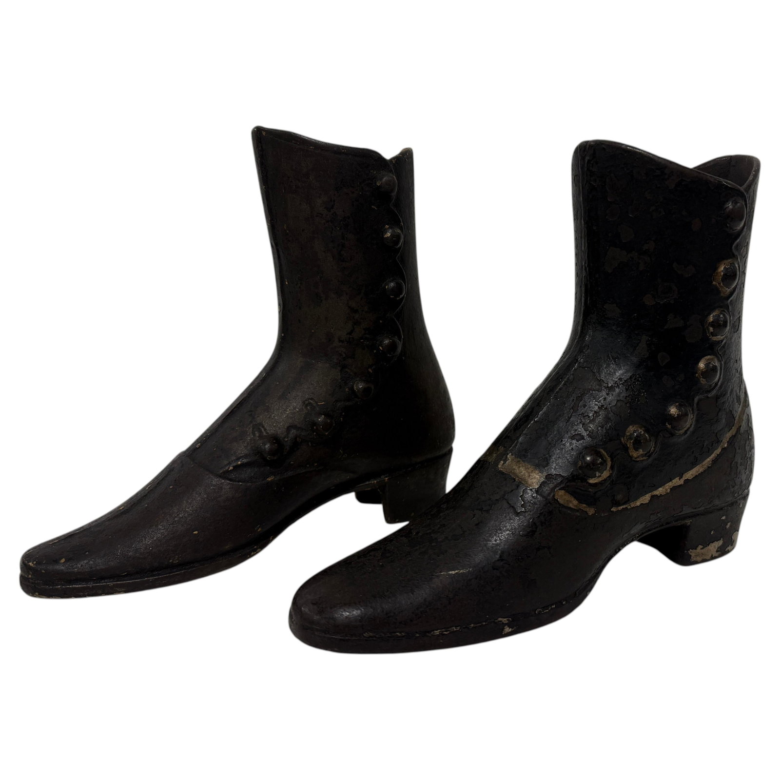 Victorian Iron Boot Form Door Stops Set by J.R. Palmenbergs & Sons: Victorian Iron Boot Form Door Stops Set by J.R. Palmenbergs & Sons This near pair of mannequin boot forms, manufactured by J.R. Palmenbergs & Sons in New York around 1880, are crafted from cast iron a
