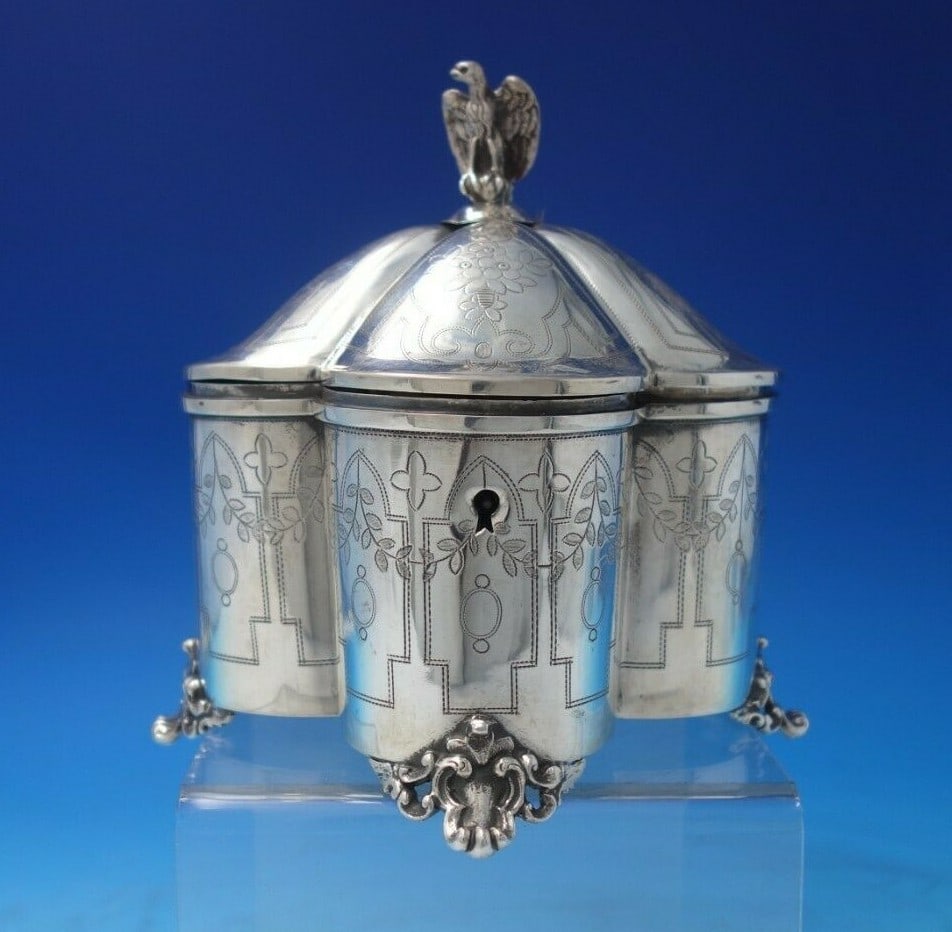 Austrian Sterling Silver Tea Caddy Eagle Finial Brite Cut c.1890: Austrian Sterling Silver Tea Caddy Eagle Finial Brite Cut c.1890 This exquisite Austrian sterling silver tea caddy, crafted circa 1890, showcases a stunning brite-cut design and an elegant eagle finia