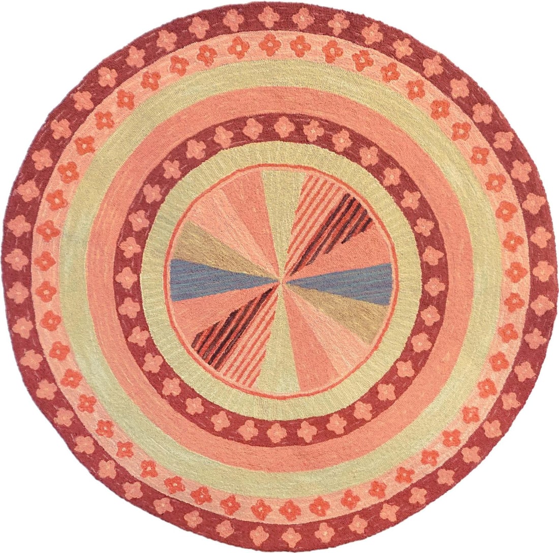 Vibrant 5' Coastal Wool Rug with Pinwheel Design: Vibrant 5' Coastal Wool Rug with Pinwheel Design Enhance your home with this vibrant coastal rug, perfect for adding warmth to any interior. This round rug showcases a beautiful coastal pinwheel desig