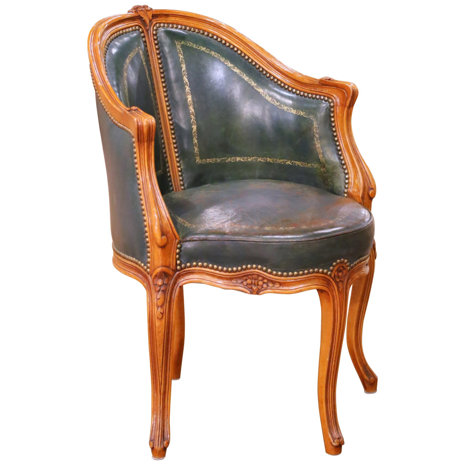 French Louis XV Walnut Armchair with Green Tooled Leather Upholstery circa 19th Century: French Louis XV Walnut Armchair with Green Tooled Leather Upholstery circa 19th Century This 19th century French Louis XV armchair is crafted from walnut and features a distinctive corner design with 
