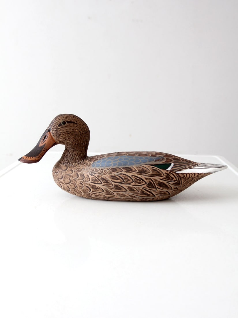 Bill Reinsager Hand-Carved 1993 Shoveler Hen Duck Decoy: Bill Reinsager Hand-Carved 1993 Shoveler Hen Duck Decoy This exquisite hand-carved and painted Shoveler Hen Duck decoy was crafted by Bill Reinsager in 1993. Renowned for capturing the unique shape an