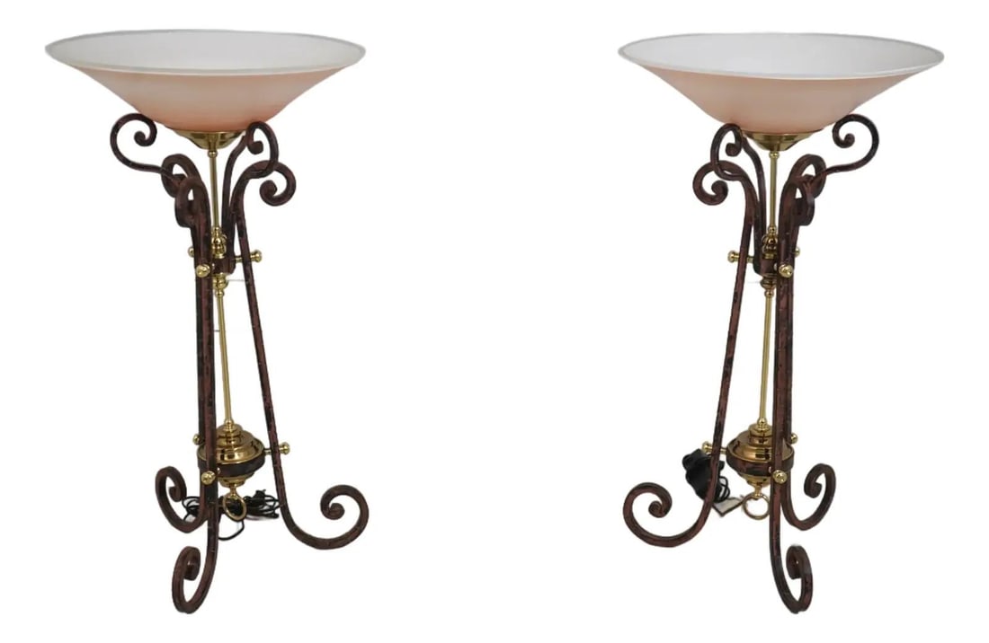 Maitland Smith Pair of Pink Globe Shade Iron Table Lamps: Maitland Smith Pair of Pink Globe Shade Iron Table Lamps This striking pair of Maitland Smith table lamps features large, impressive pink glass globe shades that beautifully diffuse light. Crafted wit