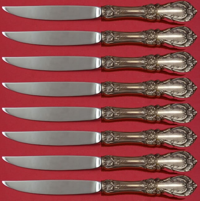 Reed & Barton Burgundy Sterling Silver Steak Knife Set 8pc Hollow Handle: Reed & Barton Burgundy Sterling Silver Steak Knife Set 8pc Hollow Handle Enhance your dining experience with this exquisite Burgundy by Reed & Barton Sterling Silver Steak Knife Set. This 8-piece set 