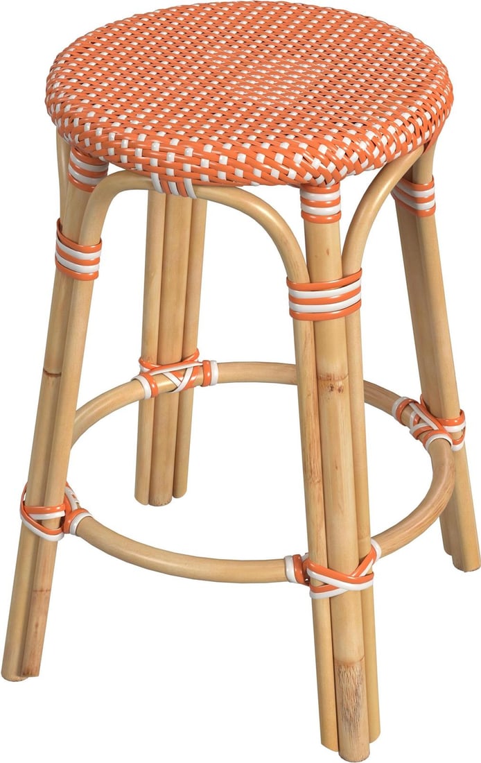 Butler Coastal Style Tobias Rattan Counter Stool Orange Finish: Butler Coastal Style Tobias Rattan Counter Stool Orange Finish Enhance your coastal decor with the Tobias Rattan Stool, an elegant addition to your home. This round counter stool features a natural ra