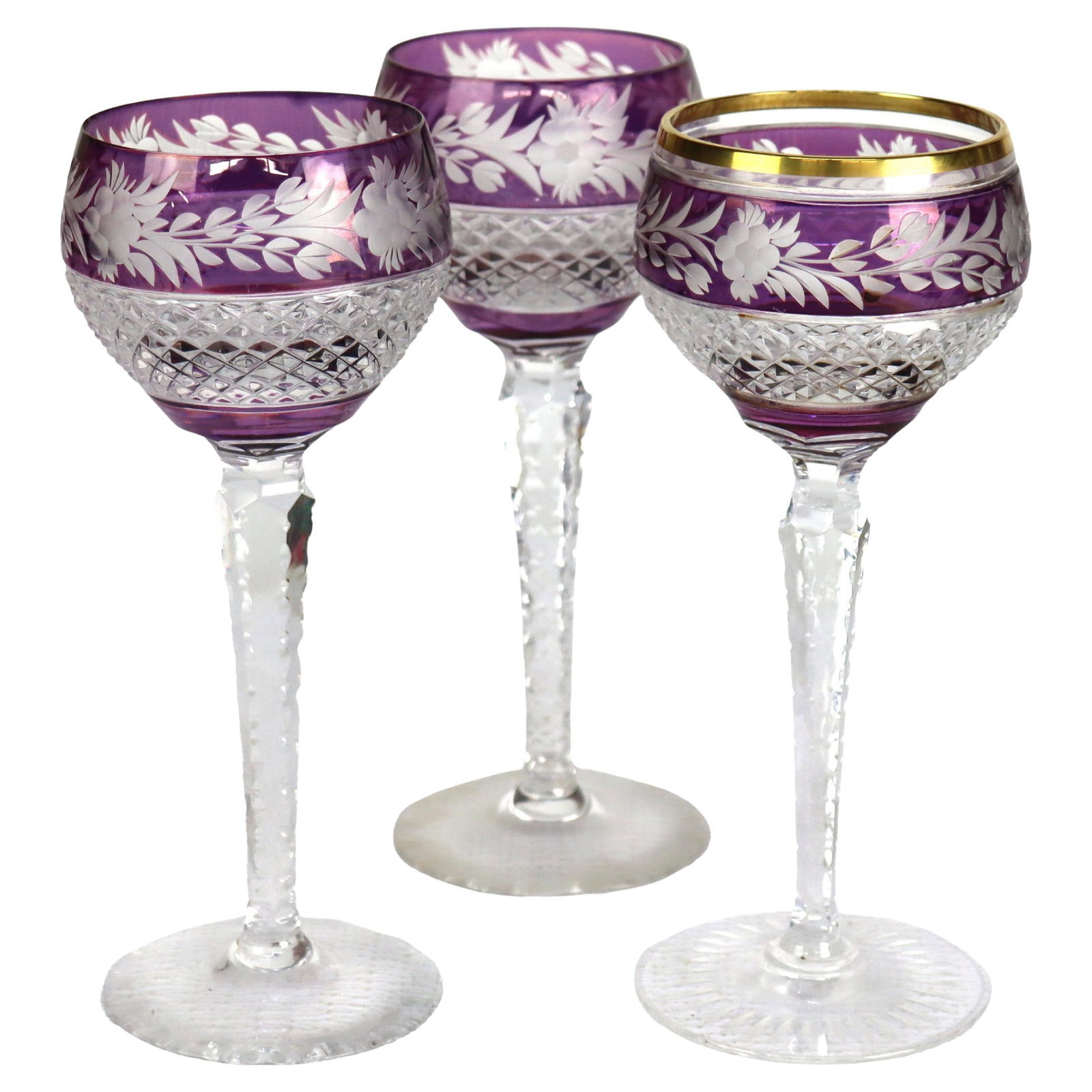 Set of 3 Bohemian Amethyst Floral Cut Glass Wine Goblets Early 20th Century: Set of 3 Bohemian Amethyst Floral Cut Glass Wine Goblets Early 20th Century This set includes three antique Bohemian amethyst floral cut-to-clear crystal stemmed wine goblets from around 1910. Each go
