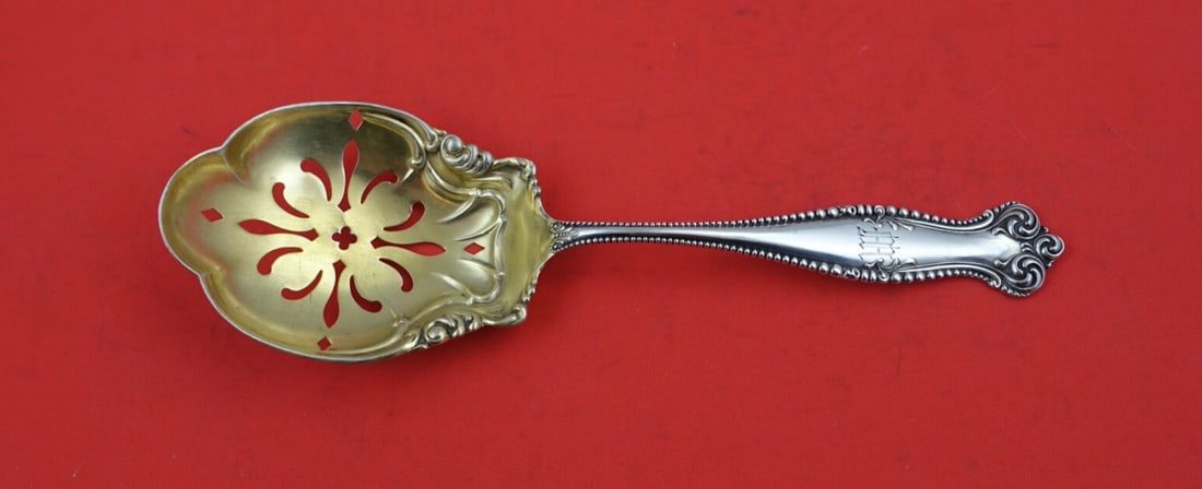 Towle Canterbury Sterling Silver Gold Washed Ice Spoon 8 Inch: Towle Canterbury Sterling Silver Gold Washed Ice Spoon 8 Inch This exquisite Canterbury by Towle ice spoon is crafted from sterling silver, featuring a pierced design and a luxurious gold wash. Measur