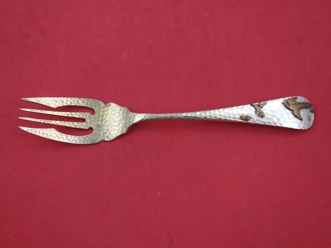 Gorham Applied Metals Sterling Silver Fish Fork 7" with Copper Bird Foliage: Gorham Applied Metals Sterling Silver Fish Fork 7" with Copper Bird Foliage This exquisite fish fork by Gorham, from the Applied Metals pattern, showcases a beautiful hand-hammered sterling silver con