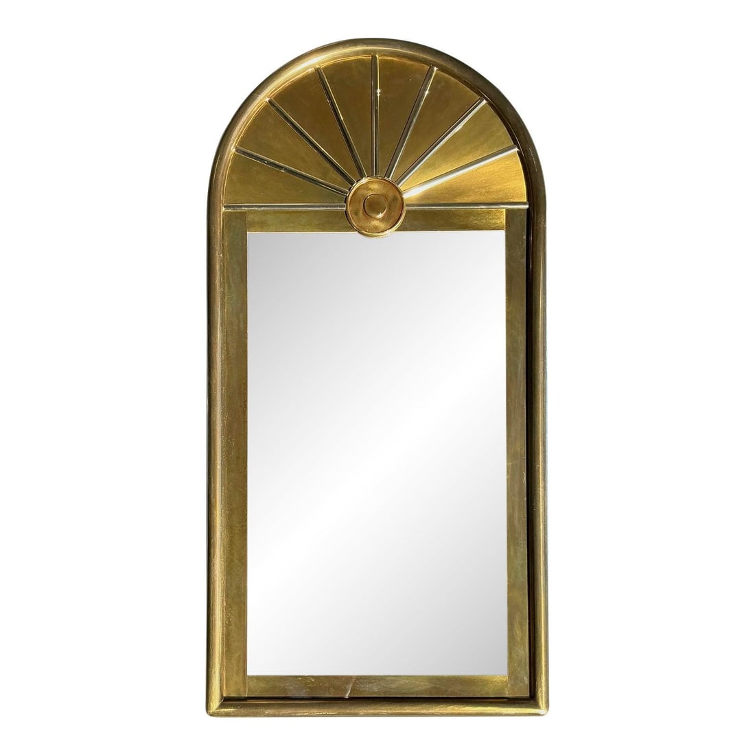 Hollywood Regency arched brass mirror with sunburst motif in the style of Mastercraft: Hollywood Regency arched brass mirror with sunburst motif in the style of Mastercraft This vintage arched brass mirror features a tall, rectangular shape topped with an elegant arch and is adorned wit