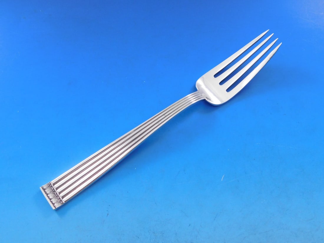 Buccellati Rigato Sterling Silver 8 Inch Dinner Fork: Buccellati Rigato Sterling Silver 8 Inch Dinner Fork Elevate your dining experience with this exquisite 8" dinner fork from the Rigato pattern by Buccellati. Crafted from high-quality sterling silver,