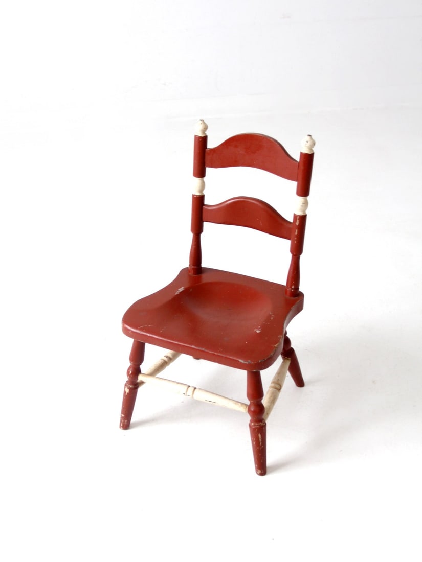 Charming Vintage Kids Ladder Back Chair Red Cream Design: Charming Vintage Kids Ladder Back Chair Red Cream Design Enhance your child's playtime with this charming Vintage Kid's Ladder Back Chair. Featuring a classic ladder back design with a delightful red-