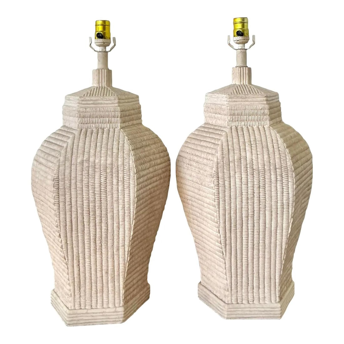 Pair of Embossed Ceramic Table Lamps with Woven Rattan Motif: Pair of Embossed Ceramic Table Lamps with Woven Rattan Motif This pair of vintage table lamps showcases a striking blend of Hollywood Regency and Organic Modernist design. Each lamp is crafted from ce
