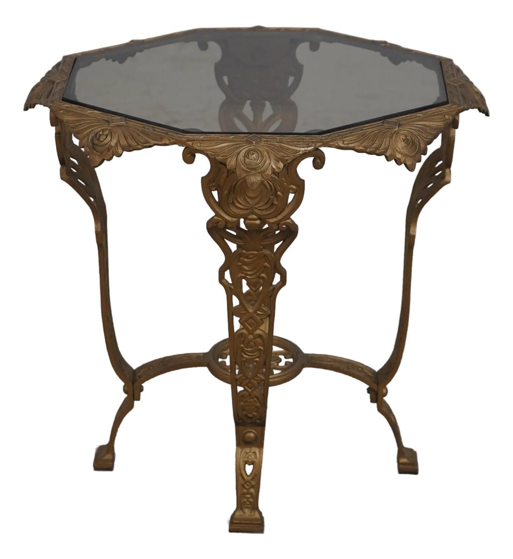 Vintage Art Deco Iron Base Occasional Table with Tinted Glass Top: Vintage Art Deco Iron Base Occasional Table with Tinted Glass Top This exquisite Vintage Art Deco Occasional Table showcases a stunning design from the 1930s. It features a tinted glass top supported 