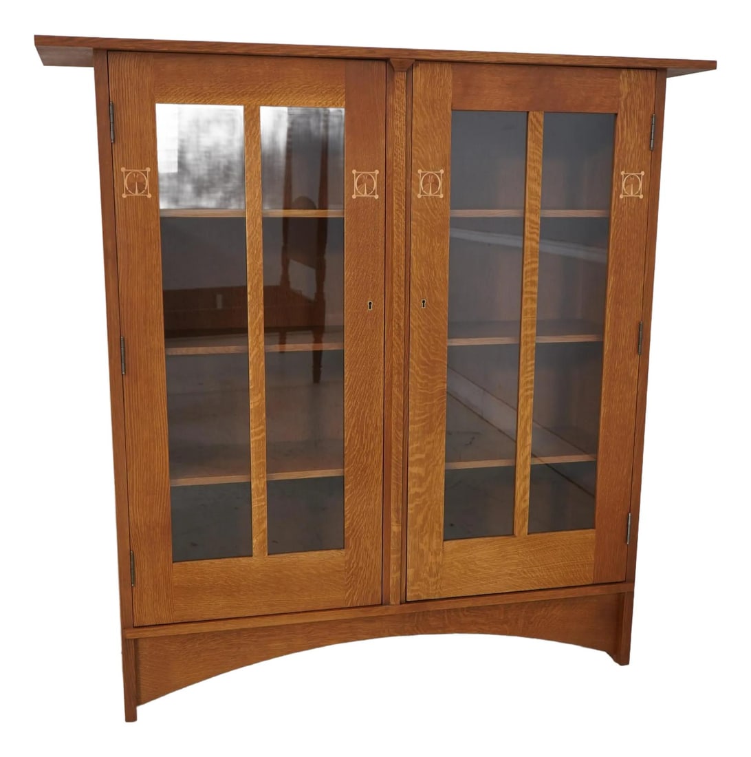 Stickley Harvey Ellis Inlaid Mission Oak 2 Door Bookcase: Stickley Harvey Ellis Inlaid Mission Oak 2 Door Bookcase This Stickley Harvey Ellis Design Inlaid Mission Oak 2 Door Bookcase is a remarkable piece that embodies the Arts & Crafts style. Crafted from 