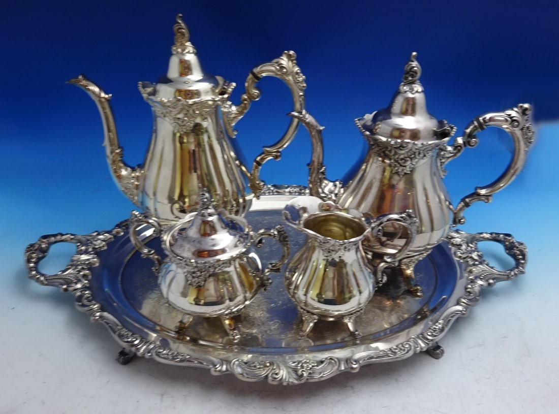 Wallace Grande Baroque Silverplate Tea Set 4pc with Tray: Wallace Grande Baroque Silverplate Tea Set 4pc with Tray Experience the elegance of the Grande Baroque by Wallace Silverplate Tea Set, featuring a stunning four-piece arrangement that includes a coffe