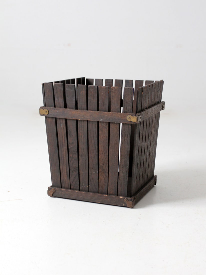 Antique Arts & Crafts Wooden Wastebasket 14in Flared Design: Antique Arts & Crafts Wooden Wastebasket 14in Flared Design This antique Arts & Crafts style wooden wastebasket dates back to the early 20th century, showcasing a flared square design with brass tacke