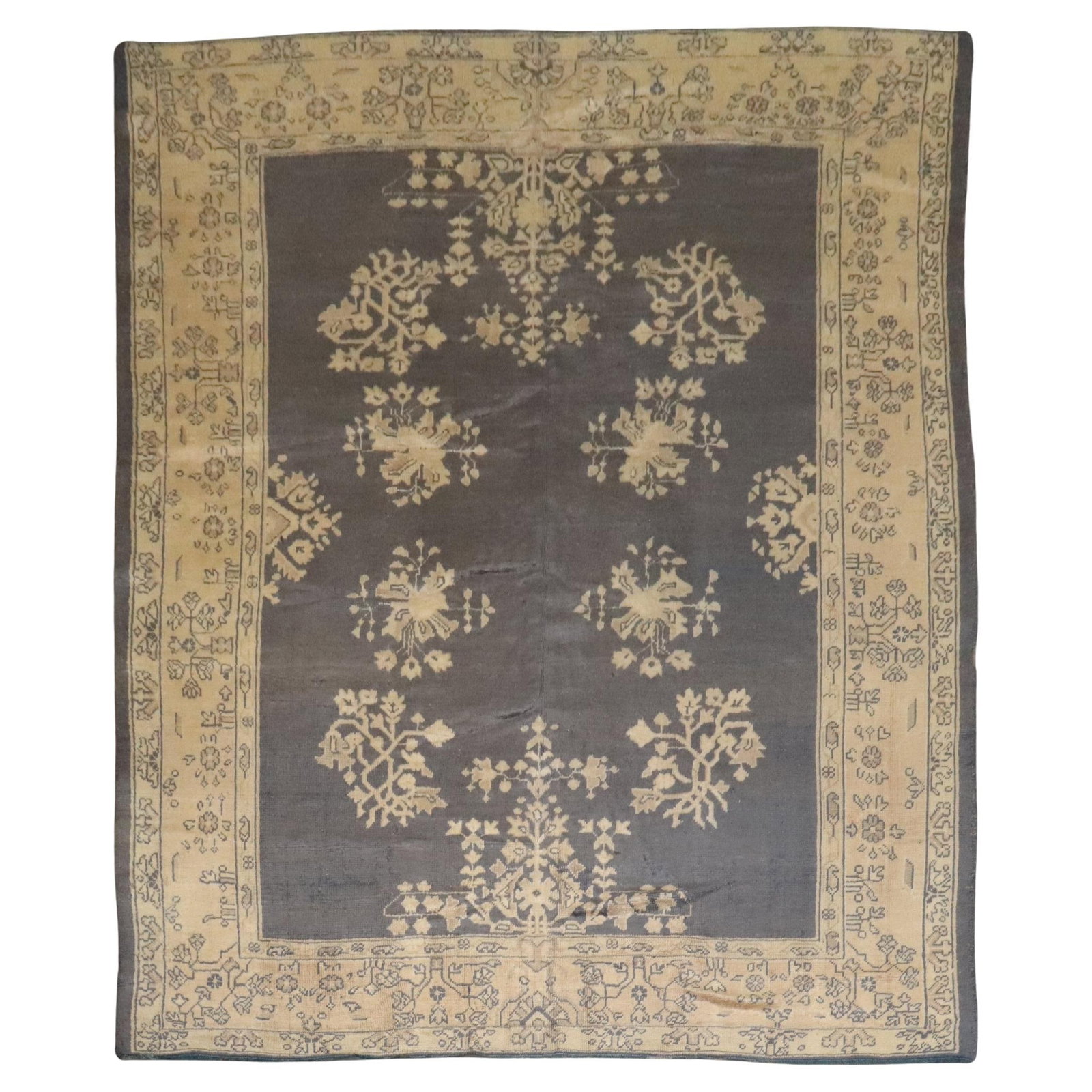 Zabihi Collection Early 20th Century Antique Turkish Oushak Rug 8'9'' x 10'9'' Hand-Woven Wool: Zabihi Collection Early 20th Century Antique Turkish Oushak Rug 8'9'' x 10'9'' Hand-Woven Wool This exquisite Antique Turkish Oushak Rug, dating back to circa 1920, showcases a unique archaistic style