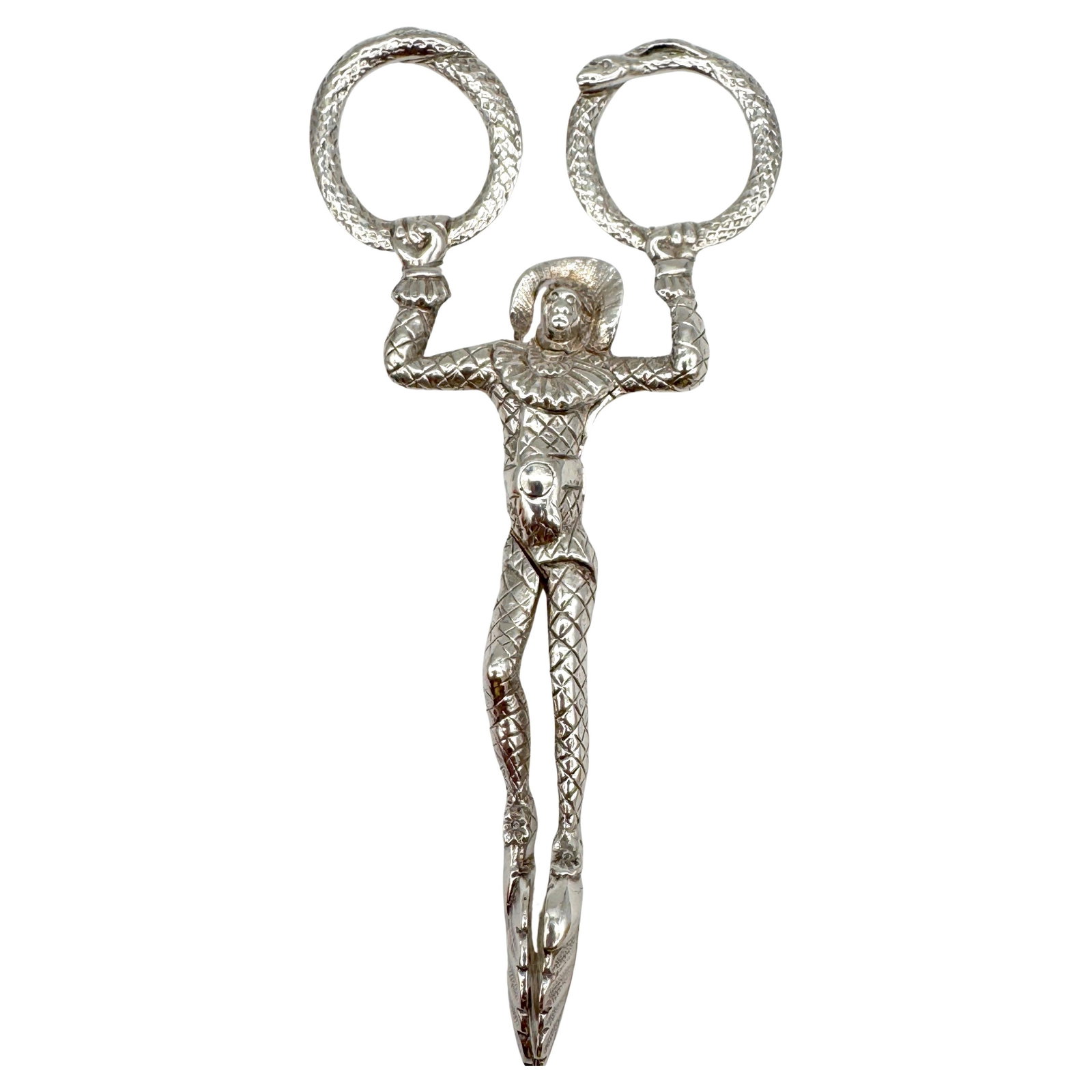 Victorian Sterling Silver Jester Ouroboros Sugar Tongs Joseph Willmore 1887: Victorian Sterling Silver Jester Ouroboros Sugar Tongs Joseph Willmore 1887 Discover a stunning pair of English Sterling Silver Sugar Tongs, intricately designed with Victorian flair. Crafted in 1887 