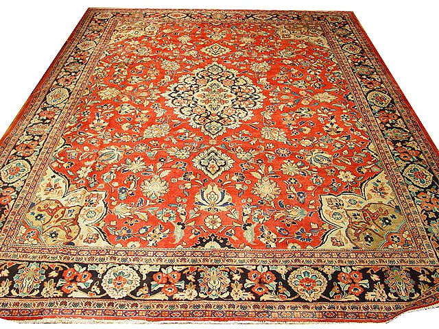 Elegant 11.2 x 14 Hand-knotted Red Sarouk Rug from Iran: Elegant 11.2 x 14 Hand-knotted Red Sarouk Rug from Iran Free continental US Shipping Introducing a captivating 11.2' x 14' Persian Sarouk rug, meticulously handcrafted by skilled artisans in Iran. Thi