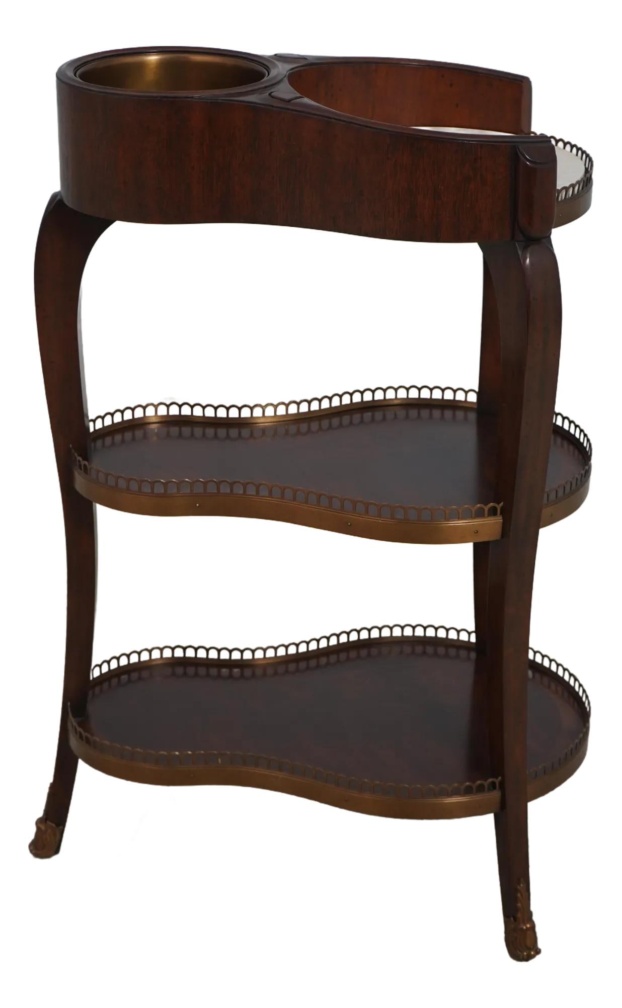 Maitland Smith French Style Mahogany Wine Table with Marble Top: Maitland Smith French Style Mahogany Wine Table with Marble Top This exquisite Maitland Smith wine table features a stunning marble top and is constructed from high-quality mahogany. Adorned with bras