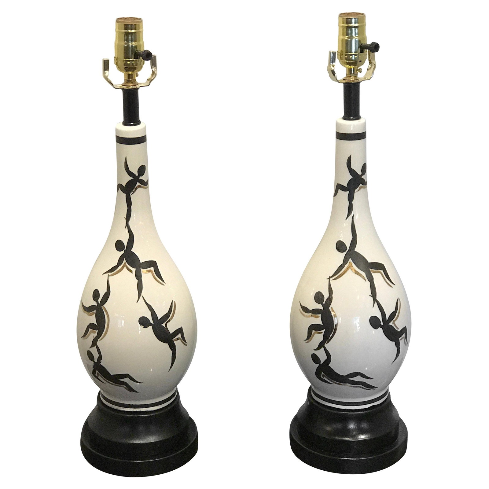 Set of 2 Italian Pottery Figural Lamps Inspired by Ernestine 1950s: Set of 2 Italian Pottery Figural Lamps Inspired by Ernestine 1950s This pair of Italian mid-century figural lamps, crafted in the 1950s in the manner of Ernestine, features hand-painted climbing figur