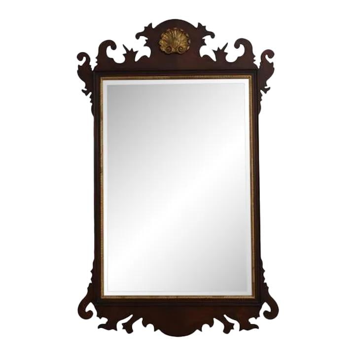 Henkel Harris Chippendale Mahogany Mirror with Beveled Glass and Gold Accents: Henkel Harris Chippendale Mahogany Mirror with Beveled Glass and Gold Accents This exquisite Henkel Harris Chippendale mirror showcases a classic design crafted from premium mahogany. The mirror featu