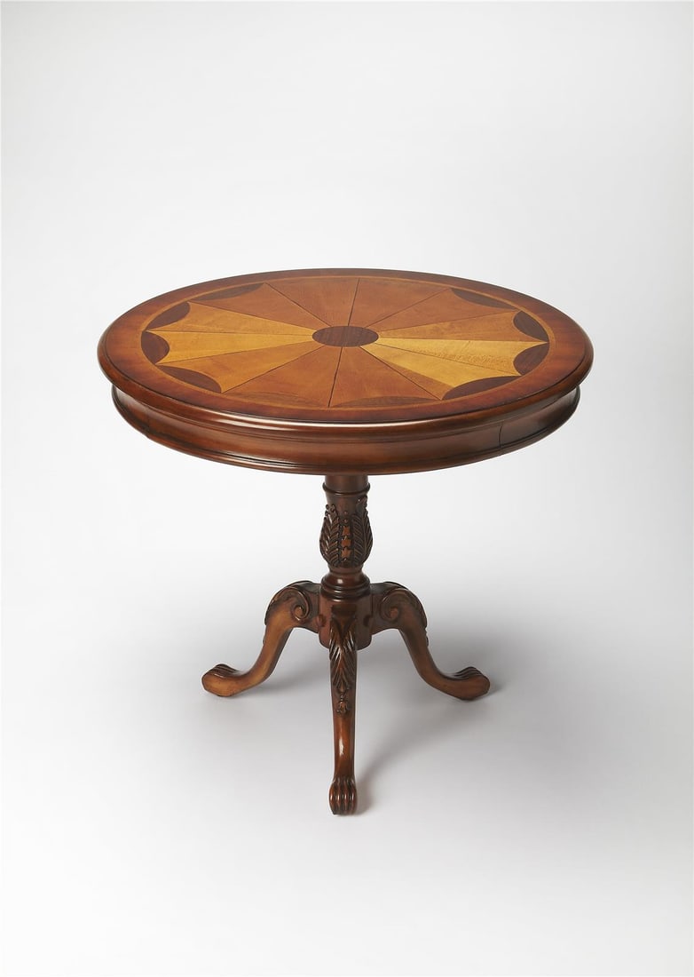 Round Brown Cherry Veneer Foyer Table by Butler: Round Brown Cherry Veneer Foyer Table by Butler This un-used Carissa foyer table from the Heritage Collection features a formal round design. Crafted with cherry veneer, MDF, and rubberwood, it is fin