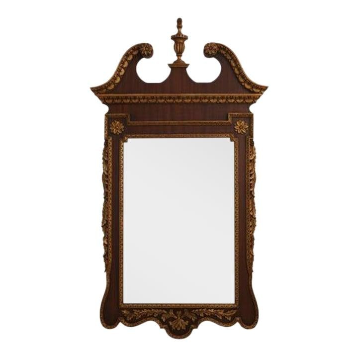 Georgian Style Mahogany Mirror with Gold Highlights 31.5 x 57: Georgian Style Mahogany Mirror with Gold Highlights 31.5 x 57 This exquisite Georgian Style Mahogany Mirror features a striking pediment top adorned with a finial, showcasing traditional craftsmanship