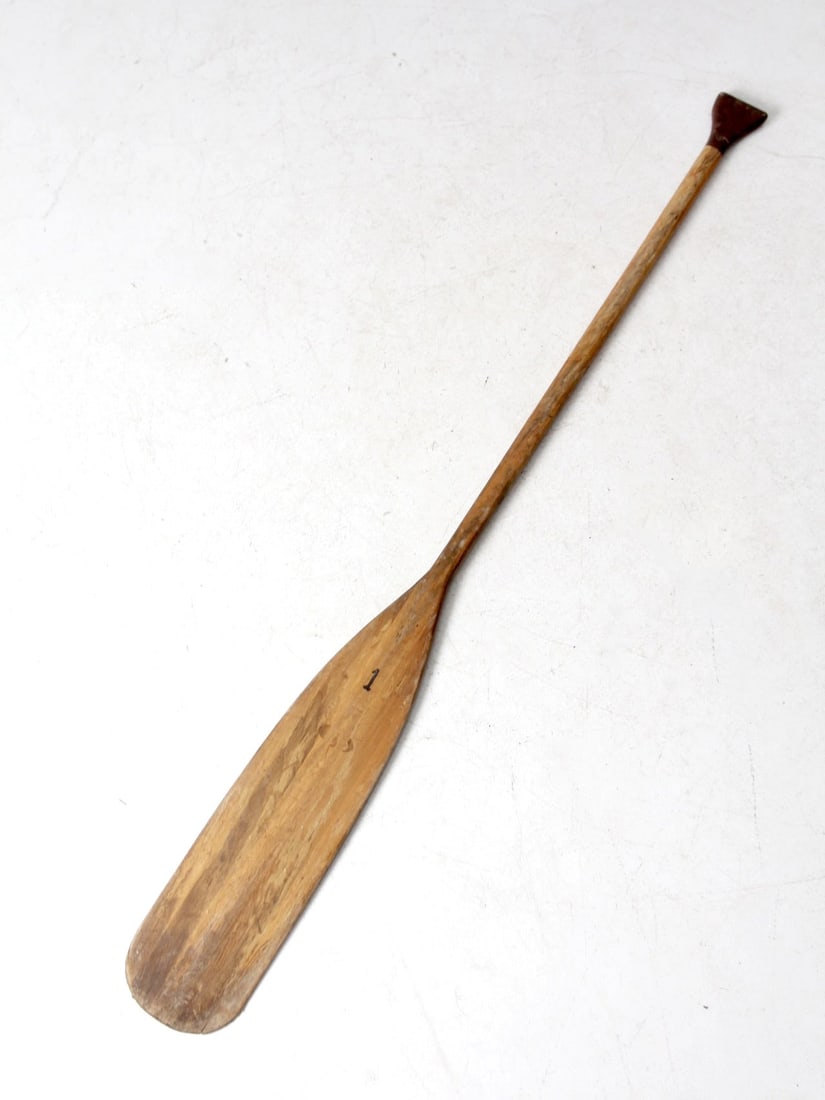 Classic Vintage Wooden Canoe Paddle 59.75 inches Rustic Decor: Classic Vintage Wooden Canoe Paddle 59.75 inches Rustic Decor This vintage wooden canoe paddle showcases classic shaping and features a simple "1" marking on both sides. It is an ideal addition to lak