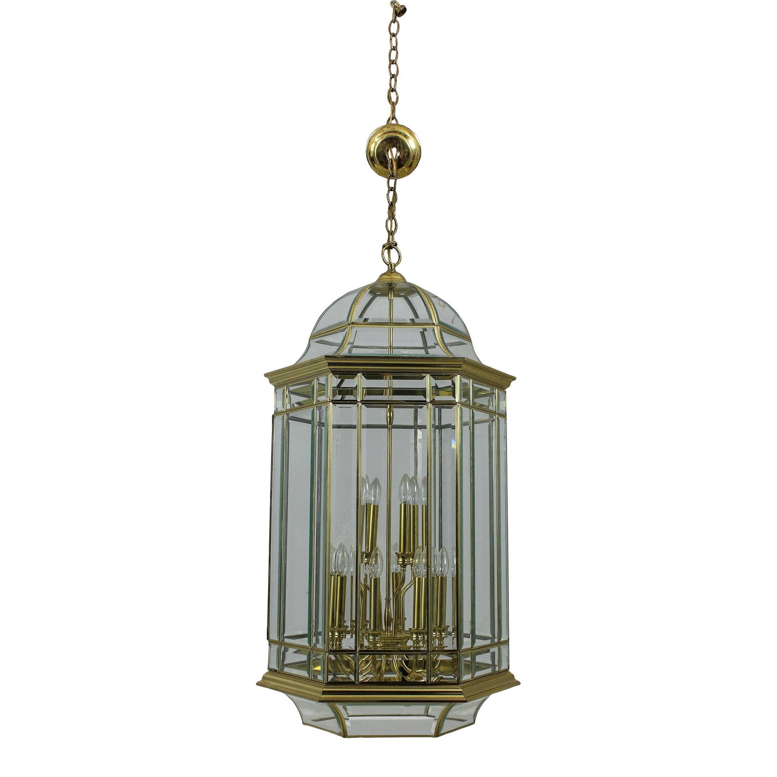 Elegant Large Brass Beveled Glass Chandelier 25 Years Old: Elegant Large Brass Beveled Glass Chandelier 25 Years Old Illuminate your space with this striking large brass and beveled glass hanging chandelier. This impressive fixture features high-quality const