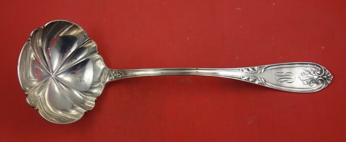 John Polhamus Leaf Shell Sterling Silver Soup Ladle 13 3/4": John Polhamus Leaf Shell Sterling Silver Soup Ladle 13 3/4" This exquisite soup ladle, designed by John Polhamus, features the elegant Leaf aka Shell pattern. Made from high-quality sterling silver, t