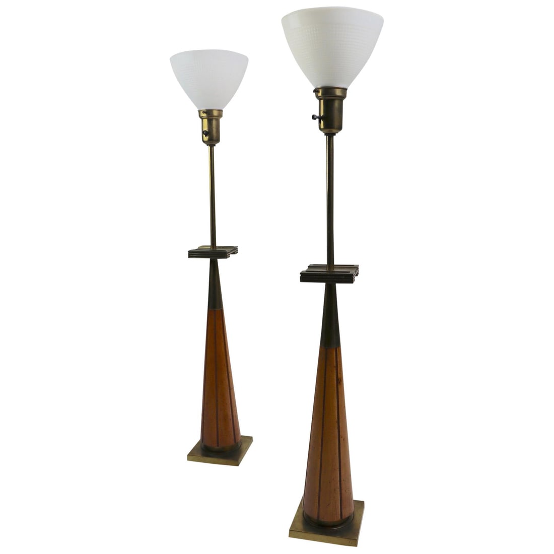 Elegant Pair of Stiffel Lamps After Parzinger Brass Wood 42in: Elegant Pair of Stiffel Lamps After Parzinger Brass Wood 42in This stylish pair of Stiffel lamps, inspired by the designs of Parzinger, features a sophisticated conical body crafted from solid wood, c