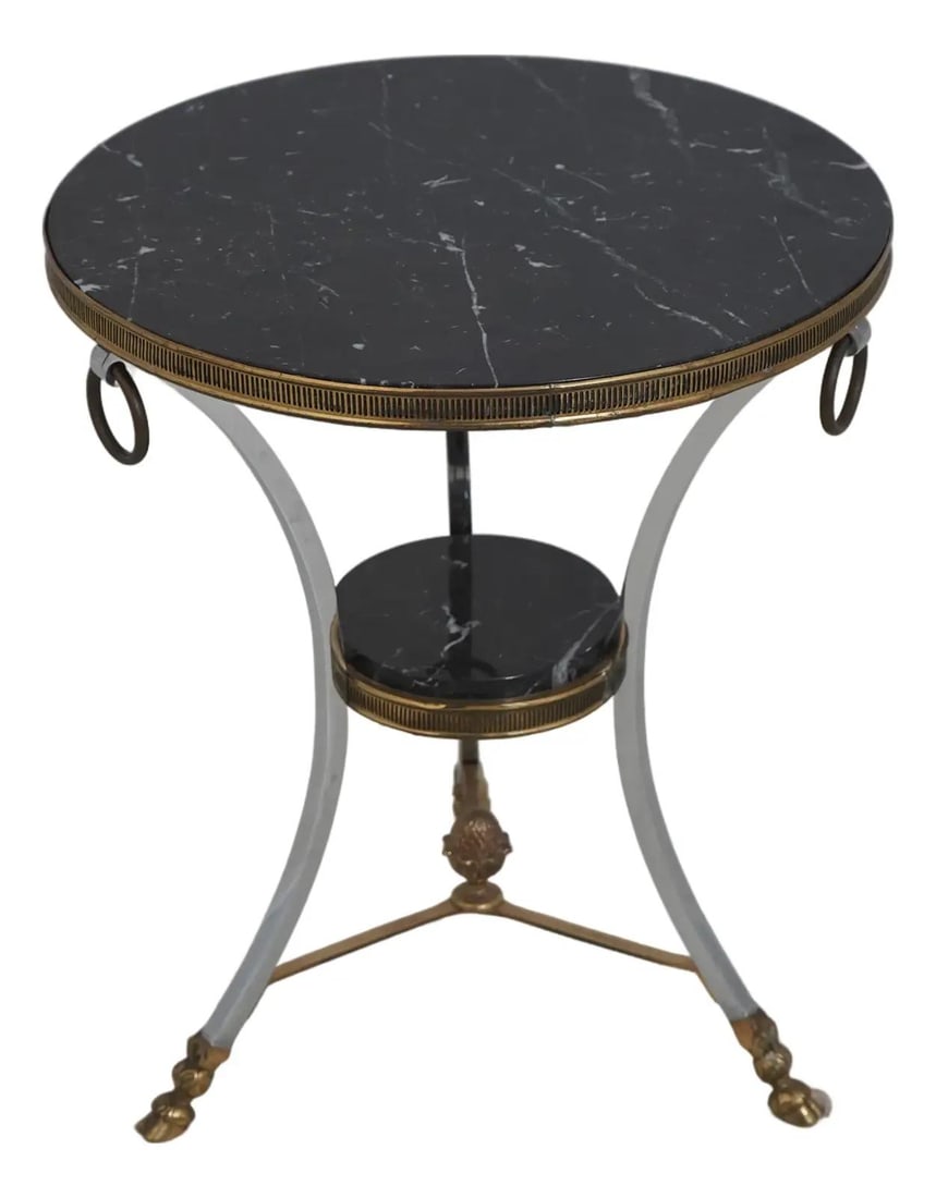 Marble Top Occasional Table with Brass Trim in Regency Style: Marble Top Occasional Table with Brass Trim in Regency Style This Regency style occasional table features a steel base accented with brass trim and is topped with a marble surface. The table is approx