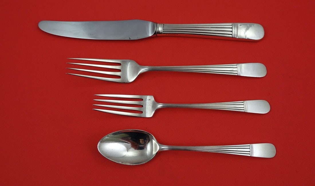 Watson Dorian Rose Sterling Silver 4-Piece Place Setting: Watson Dorian Rose Sterling Silver 4-Piece Place Setting Enhance your dining experience with this exquisite 4-piece place setting from the Dorian Rose pattern by Watson. Crafted from high-quality ster