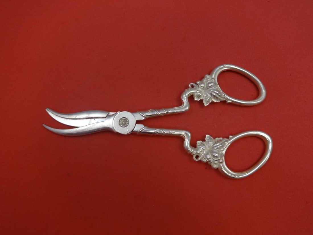 Tiffany & Co. Sterling Silver Grape Shears 6.75 Inches: Tiffany & Co. Sterling Silver Grape Shears 6.75 Inches This exquisite pair of grape shears from Tiffany & Co. is crafted from high-quality sterling silver. Measuring 6 3/4 inches, these shears feature