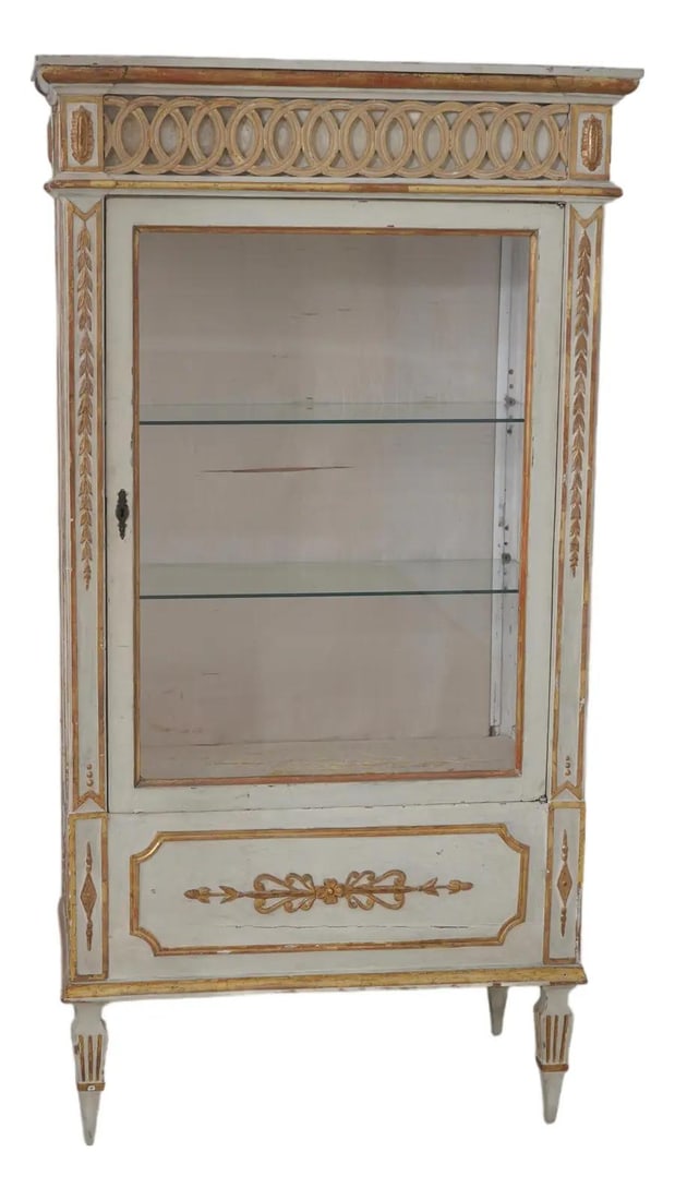 French Style Gilt Wood Vitrine Cabinet With Adjustable Shelves and Glass Doors: French Style Gilt Wood Vitrine Cabinet With Adjustable Shelves and Glass Doors This antique Louis XVI gilt vitrine display cabinet features finely carved details, adjustable shelves, and high-quality 