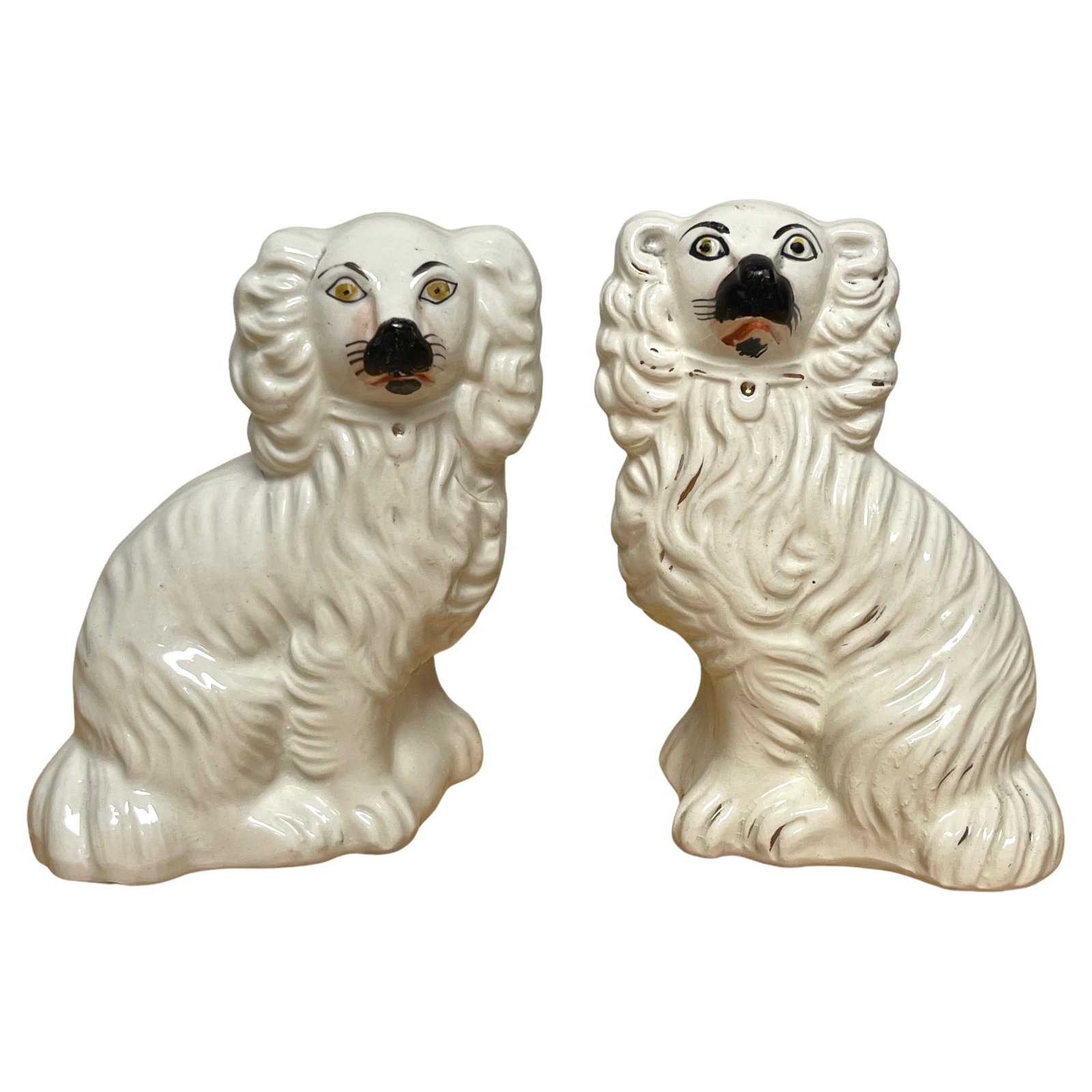 Antique Staffordshire Black White Spaniels Set of 2 C. 1860s: Antique Staffordshire Black White Spaniels Set of 2 C. 1860s This exceptional pair of diminutive antique Staffordshire black and white seated spaniels dates back to the 1860s. Each spaniel is meticulo