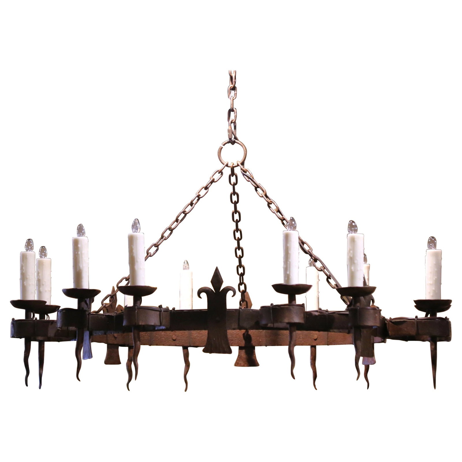 Gothic 19th Century French Wrought Iron Chandelier with Fleur-de-Lys: Gothic 19th Century French Wrought Iron Chandelier with Fleur-de-Lys This stunning 19th Century French wrought iron chandelier boasts twelve lights and intricate Fleur-de-Lys motifs, making it a remar