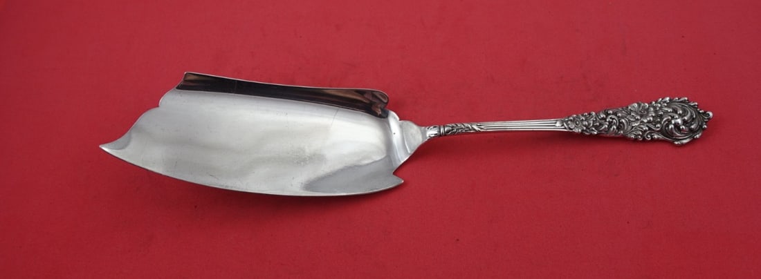 Reed and Barton Trajan Sterling Silver Ice Cream Server 10.5": Reed and Barton Trajan Sterling Silver Ice Cream Server 10.5" Discover the elegance of the Trajan ice cream server by Reed and Barton, crafted from high-quality sterling silver. This exquisite serving