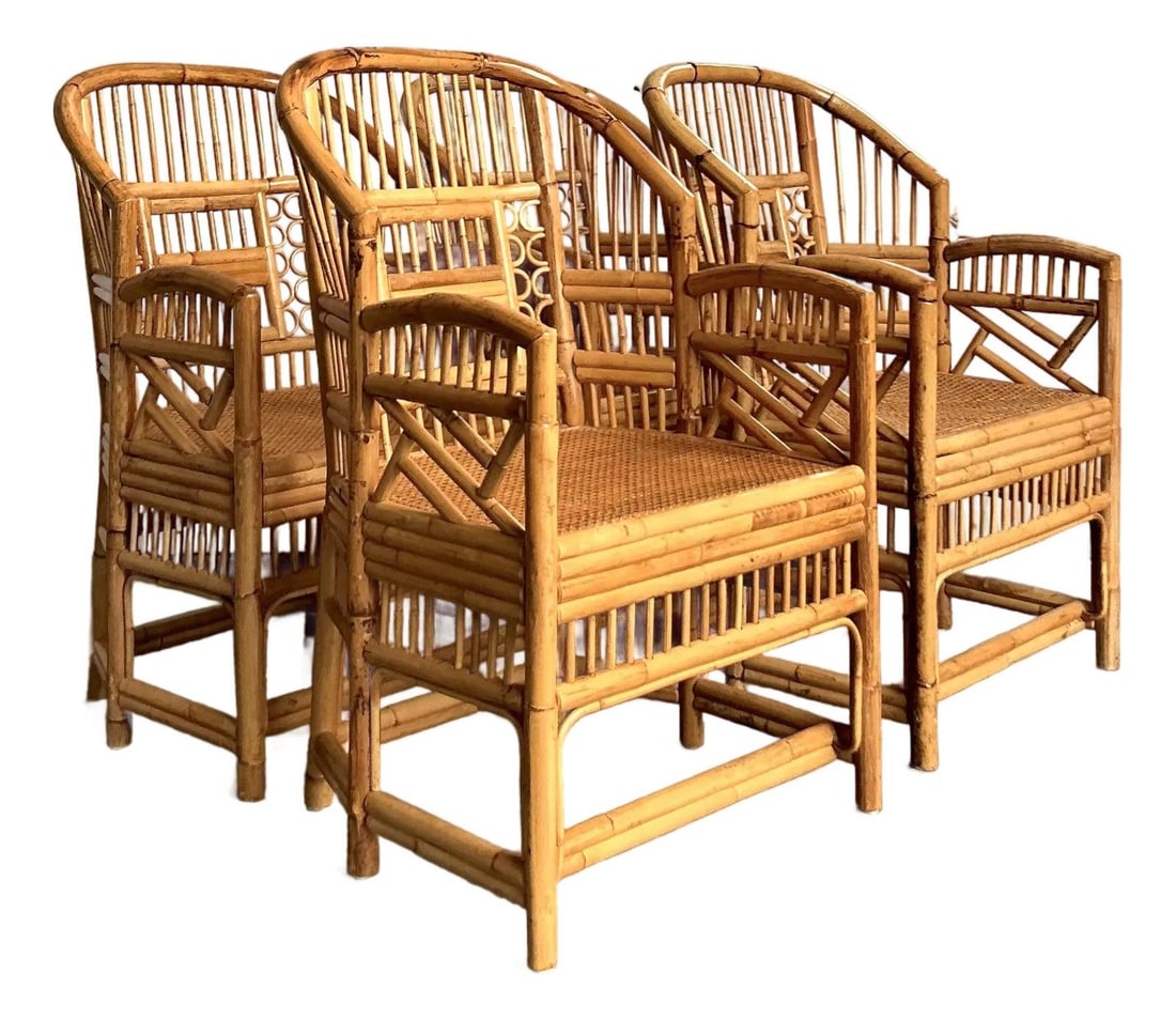 Set of Four Rattan Brighton Pavilion Style Dining Chairs with Cane Seats: Set of Four Rattan Brighton Pavilion Style Dining Chairs with Cane Seats This set of four vintage Brighton Pavilion style dining chairs showcases the intricate design of the "Chinese Chippendale" aest