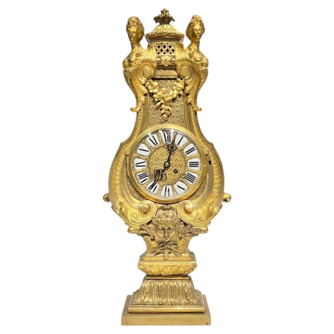 Louis XIV Inspired Gilt Bronze French Mantel Clock by AD Mougin After Boulle: Louis XIV Inspired Gilt Bronze French Mantel Clock by AD Mougin After Boulle This impressive late 19th-century mantel clock is crafted in the French Louis XIV style after the model by Andre-Charles Bo