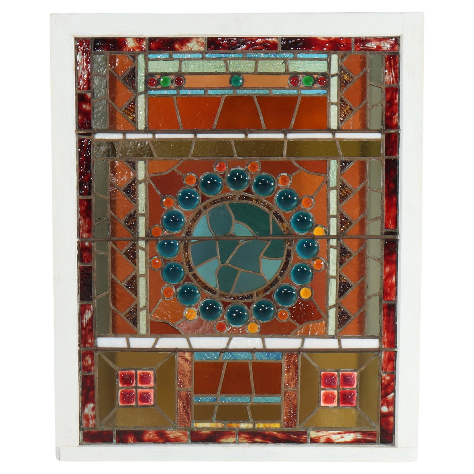 Late 19th Century Stained Glass Window With Jeweled Stylized Globe Motif: Late 19th Century Stained Glass Window With Jeweled Stylized Globe Motif This antique stained and jeweled leaded glass window from the late 19th century features an aesthetic design with a stylized gl