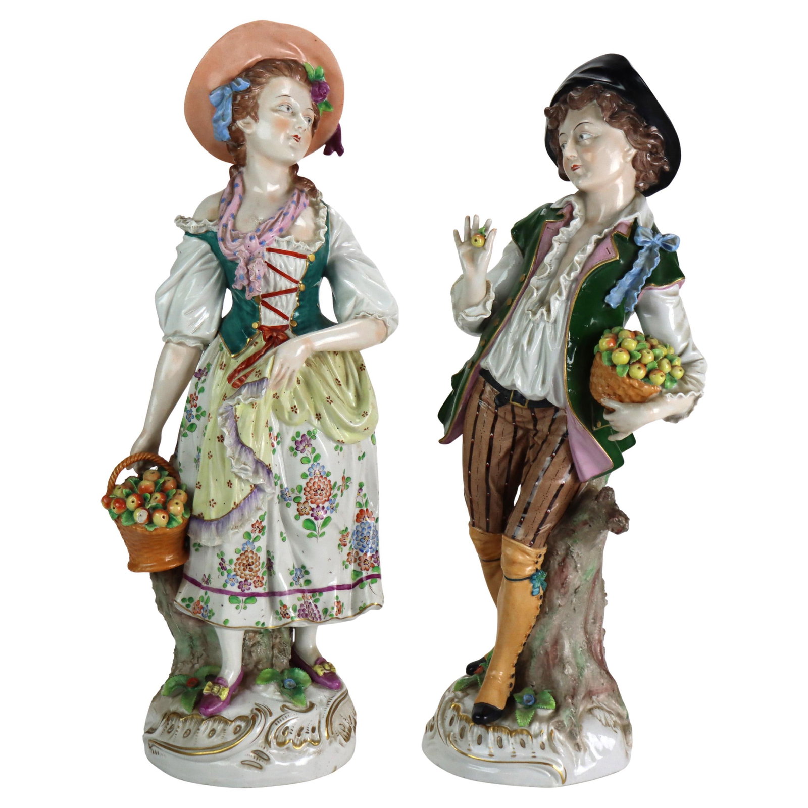 Set of 2 Large German Majolica Porcelain Maiden and Lad Figures circa 1920: Set of 2 Large German Majolica Porcelain Maiden and Lad Figures circa 1920 This set includes two oversized antique German Majolica porcelain figures from circa 1920, depicting a maiden and a lad. Each