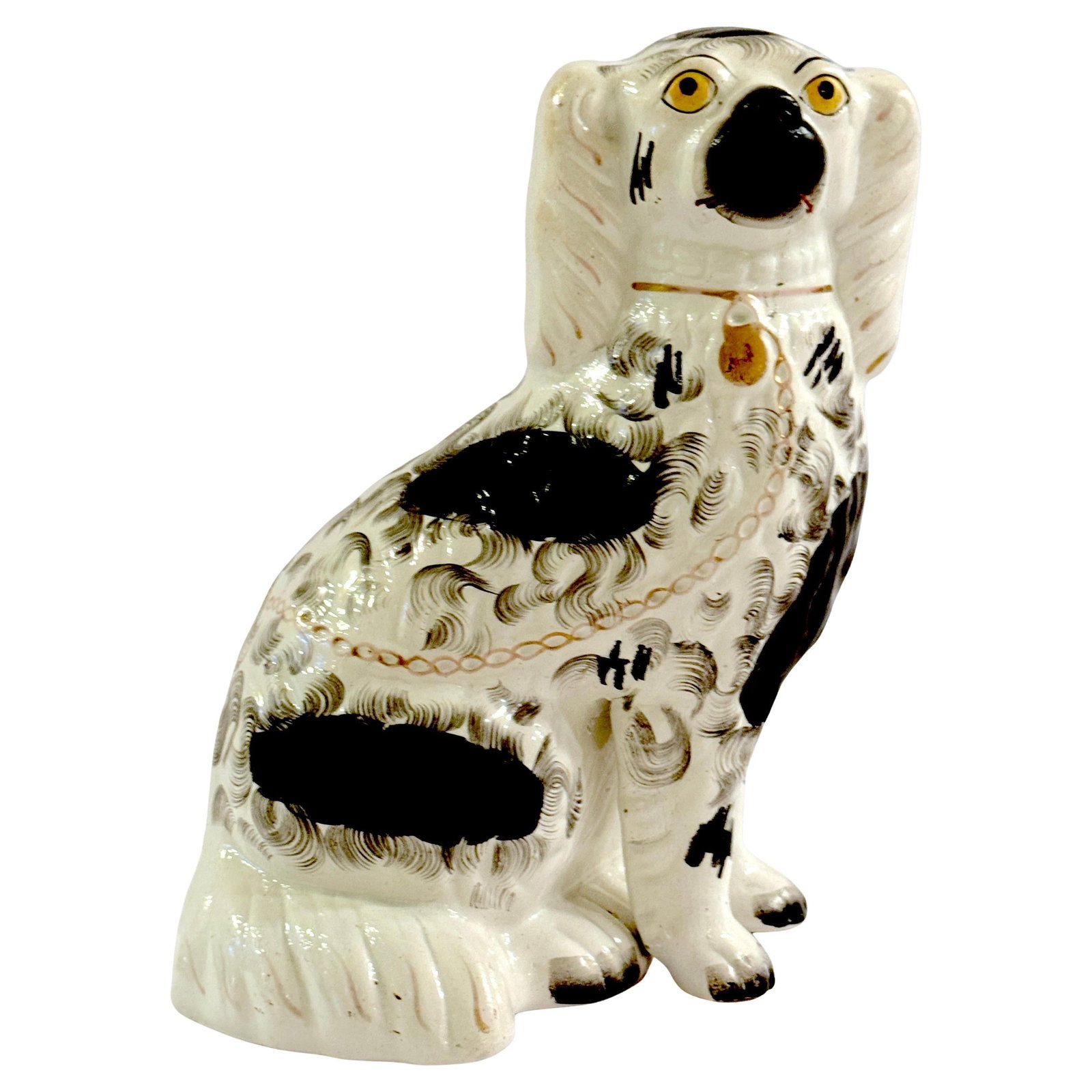 Unique 19th Century Staffordshire Black and White Spaniel Figurine: Unique 19th Century Staffordshire Black and White Spaniel Figurine This rare 19th-century Staffordshire black-and-white spaniel figure, crafted in England circa 1860, exemplifies the artistry of tradi