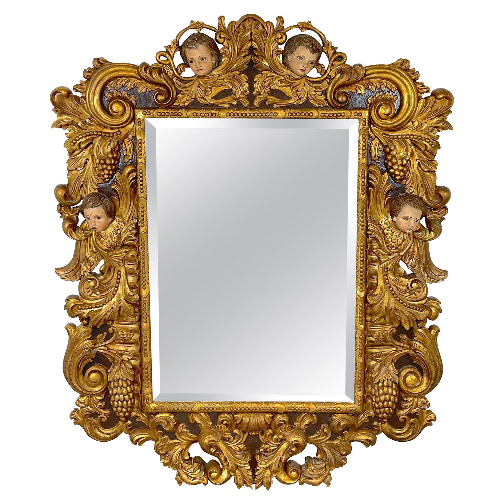 Exquisite 20th Century Italian Baroque Giltwood Mirror with Putti: Exquisite 20th Century Italian Baroque Giltwood Mirror with Putti This exquisite palatial Italian carved figural giltwood and polychromed Baroque style mirror showcases masterful craftsmanship charact