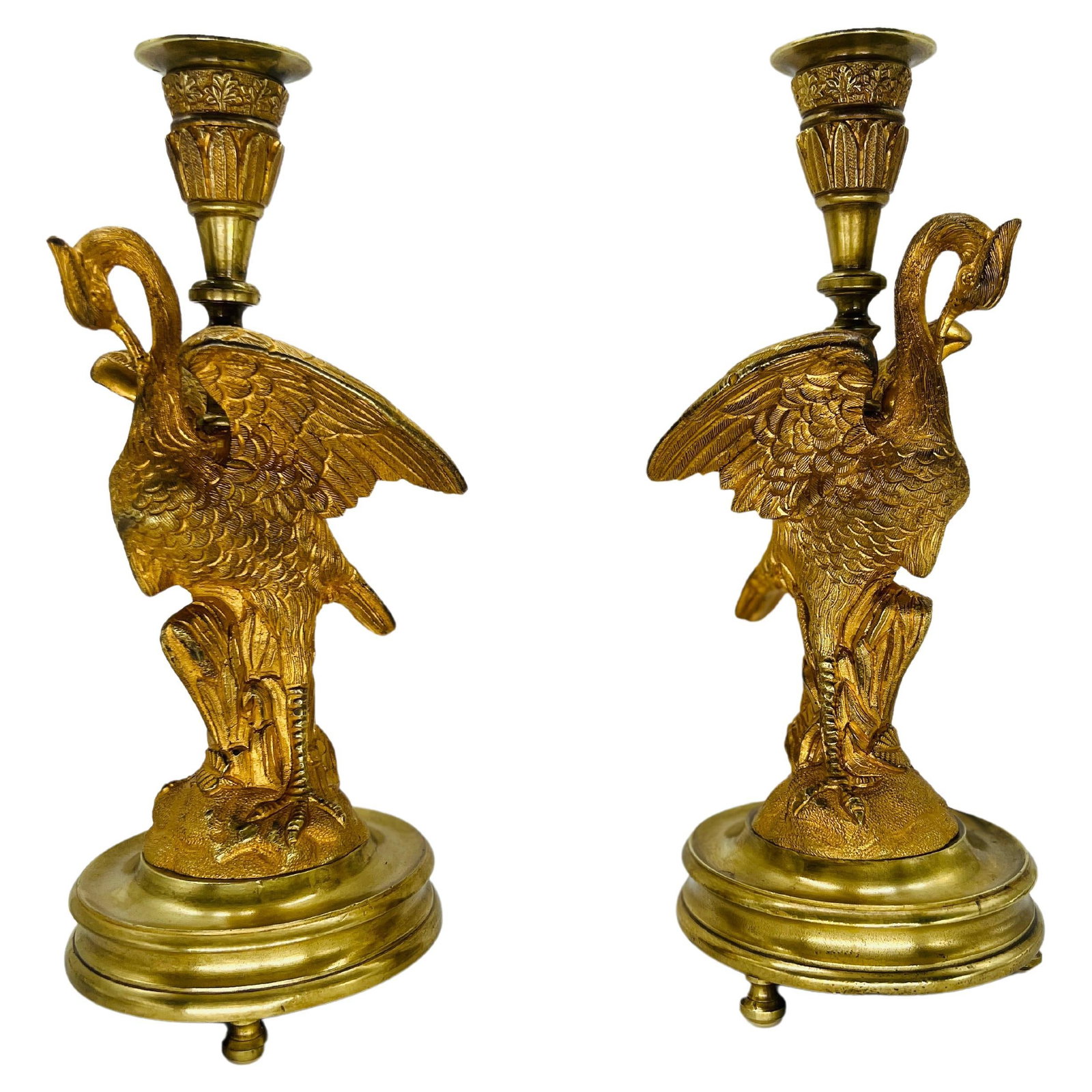 Set of 2 French Empire Gilt Bronze Crane Candlesticks Circa 1815: Set of 2 French Empire Gilt Bronze Crane Candlesticks Circa 1815 This exquisite pair of French Empire gilt bronze candlesticks, crafted circa 1815, embodies the opulence and grandeur of the Empire sty