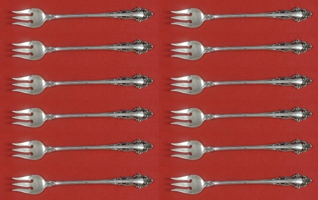 Reed and Barton Grande Renaissance Sterling Silver Cocktail Fork Set 12 pcs: Reed and Barton Grande Renaissance Sterling Silver Cocktail Fork Set 12 pcs Enhance your dining experience with this exquisite set of 12 Sterling Silver Cocktail Forks from the Grande Renaissance patt